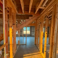 Interior hallway framing and millwork detail inside an Elite Solutions of Texas custom home project
