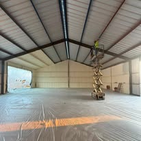 Insulated metal building interior prepared for interior finish-out by Elite Solutions of Texas